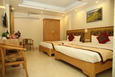 Chambre Deluxe Queen avec deux lits queen-size — REGAL SAPA HOTEl