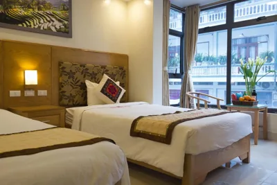 Chambre Triple avec vue sur la ville — REGAL SAPA HOTEl